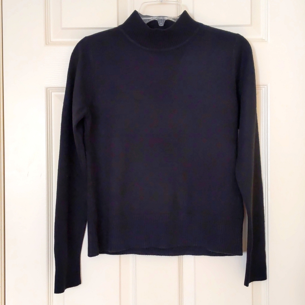 Woman's 2" turtleneck sweater.